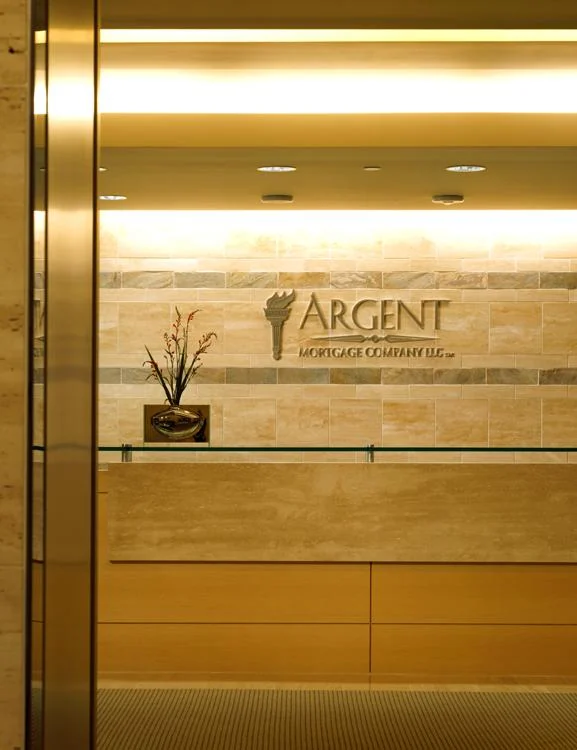 Closer view of the Argent Mortgage reception desk.