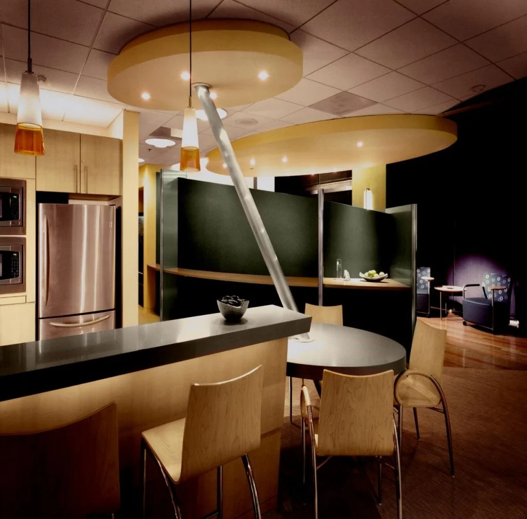 Café counter and round timber tables.