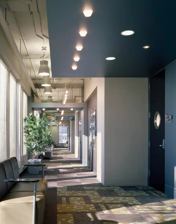 Sunlit corridor at the Rolling Meadows training center.