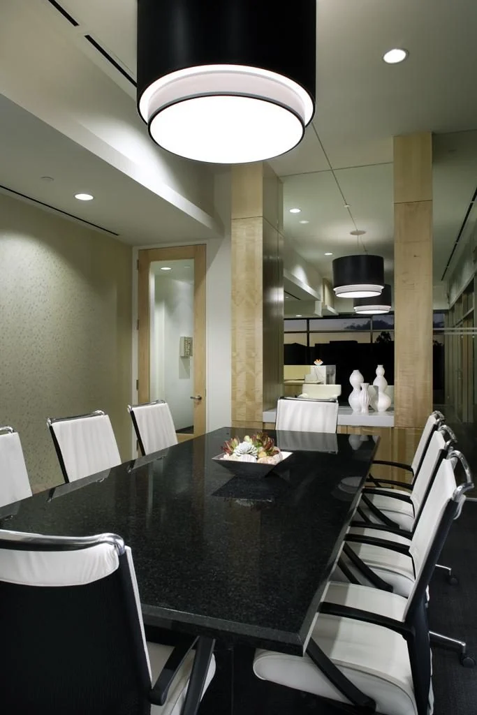 Meeting room with a long conference table.