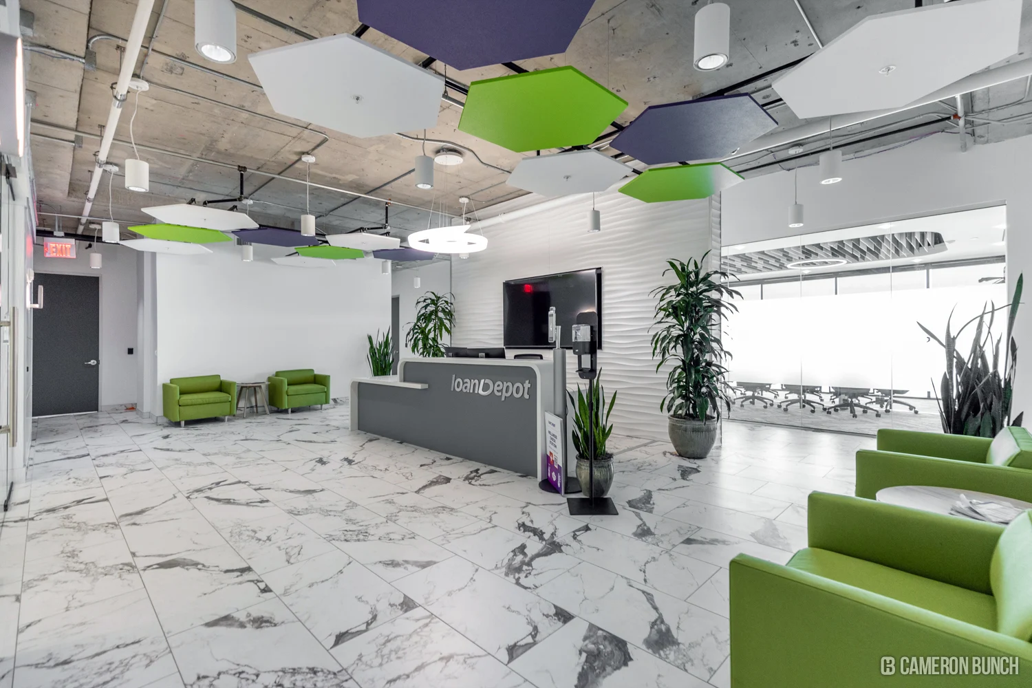 loanDepot reception with purple and green accents.