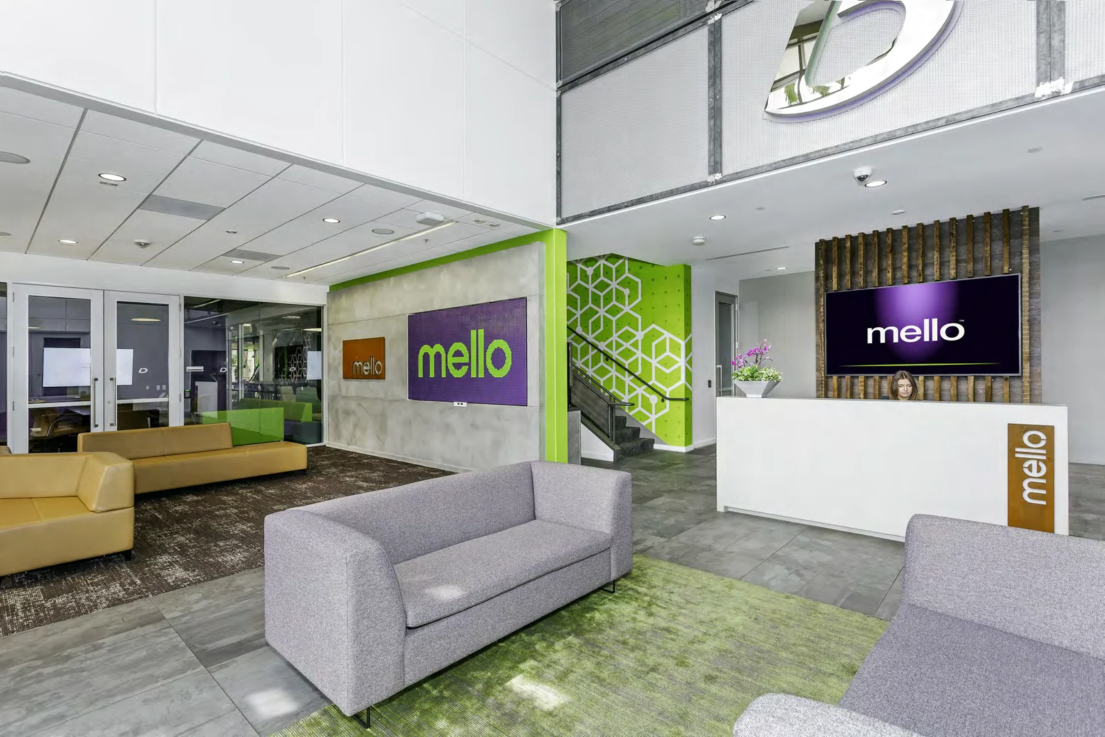 Mello reception with green and purple brand details.