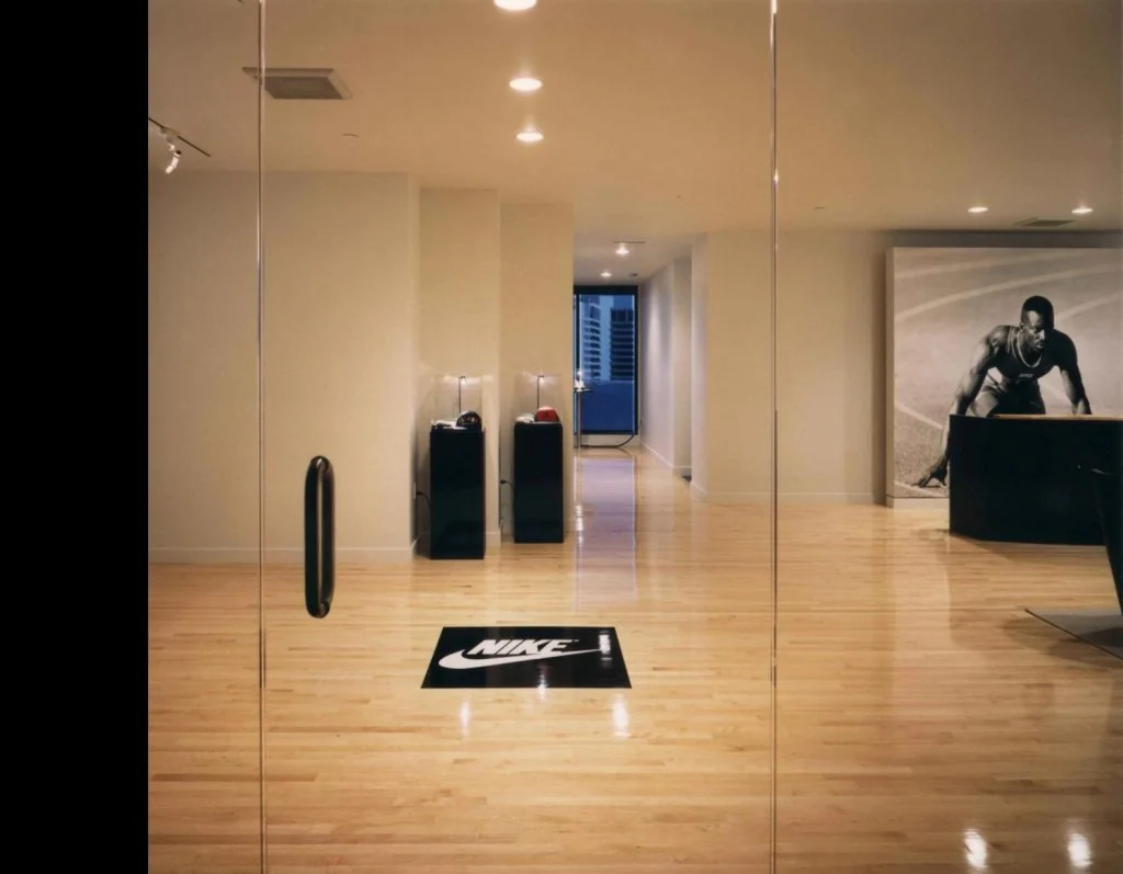 Nike entrance and branded floor mat.